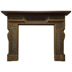 19th Century Victorian Stripped Walnut Fire Surround with Carved Sun God