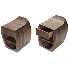 A pair of solid ash bedside tables with ebony stained grain by Jonathan Field