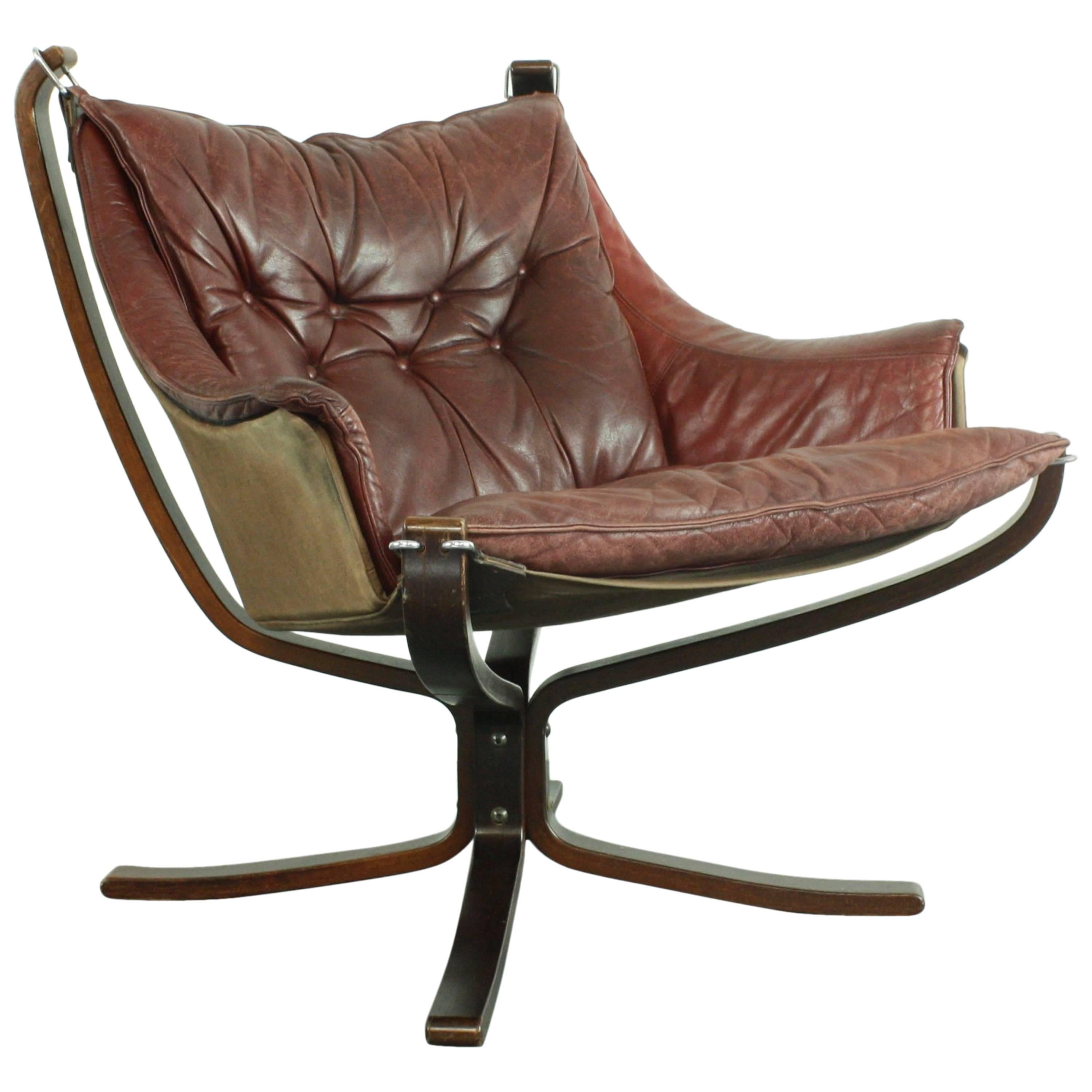 Low Back Winged Chestnut Brown Leather Falcon Chair Designed by Sigurd Resell For Sale
