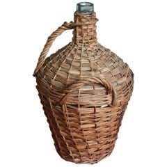 Vintage French Handwoven Basket with a Large Demijohn Glass Wine Bottle