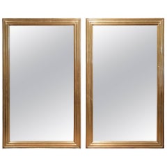 Pair of 19th Century French Louis XVI Carved and Brass Rectangular Wall Mirrors Pair of 19th Century French Louis XVI Carved and Brass Rectangular Wall Mirrors