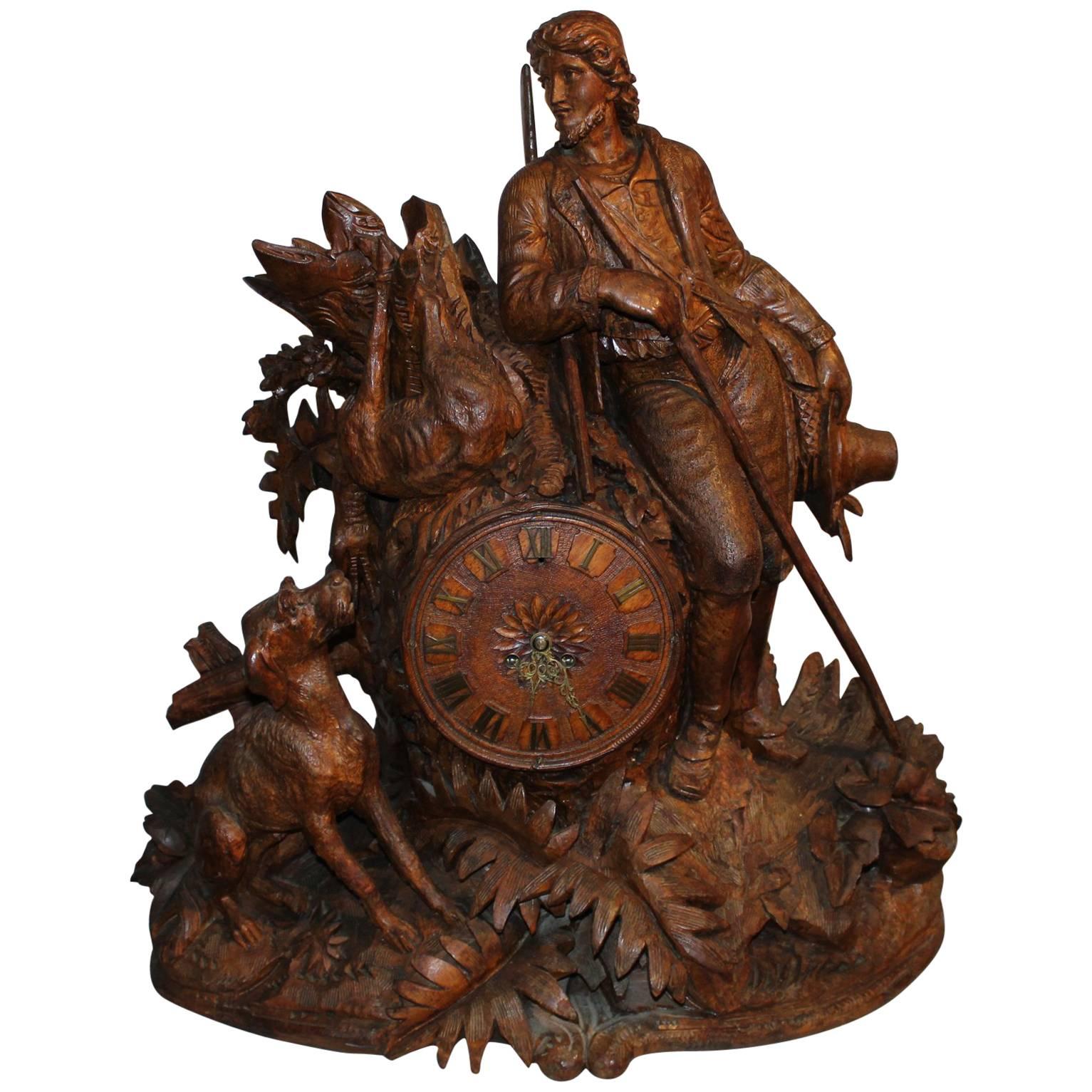 Monumental Black Forest Carved Mantel or Shelf Clock with Hunter and Dog