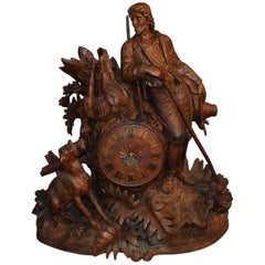 Monumental Black Forest Carved Mantel or Shelf Clock with Hunter and Dog