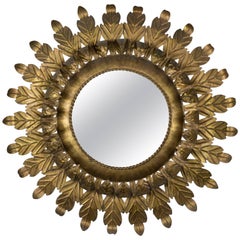 Round Gilt Iron Sunburst Mirror with Leaf Frame