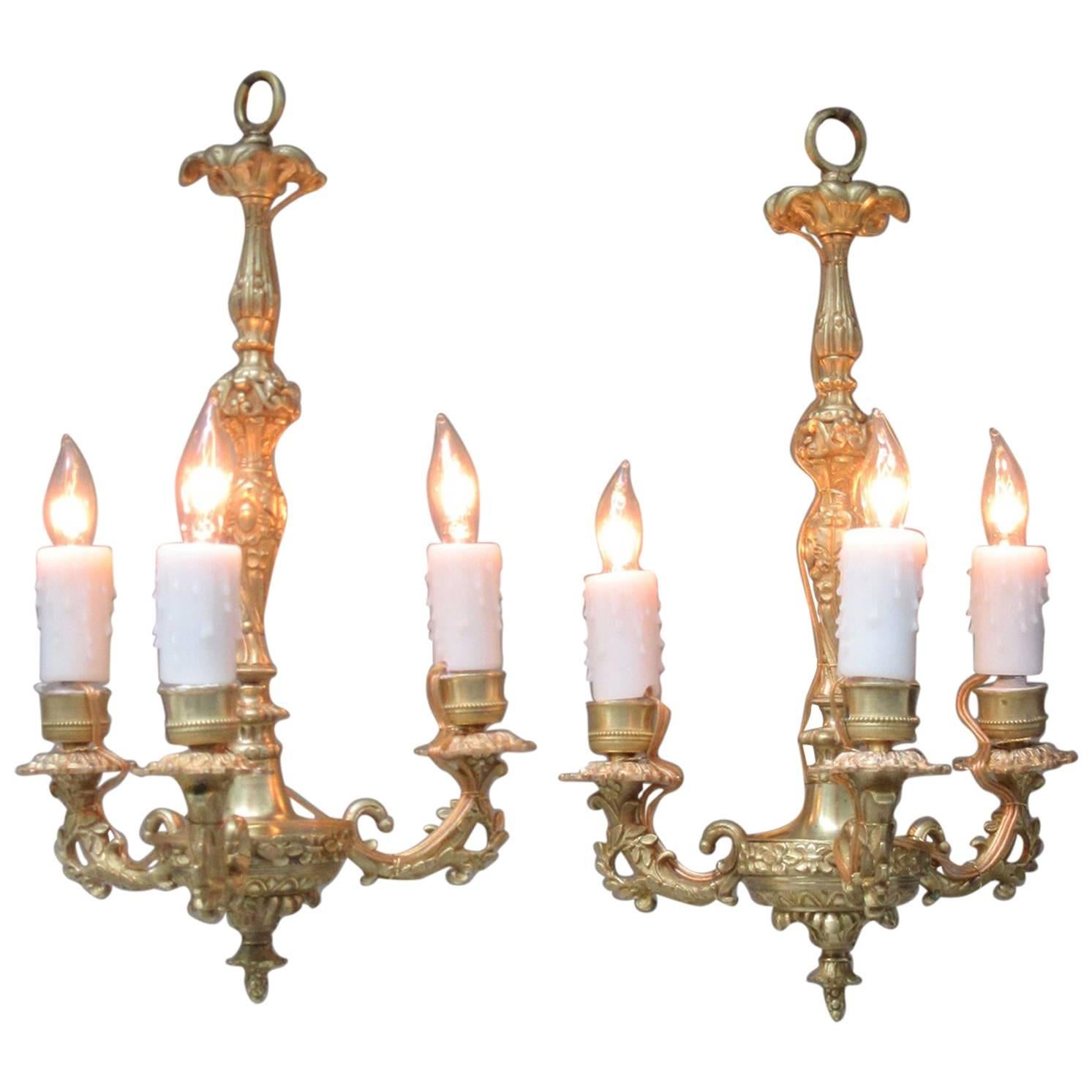 Diminutive Pair of 19th Century French Louis XIV Bronze Doré Chandeliers For Sale