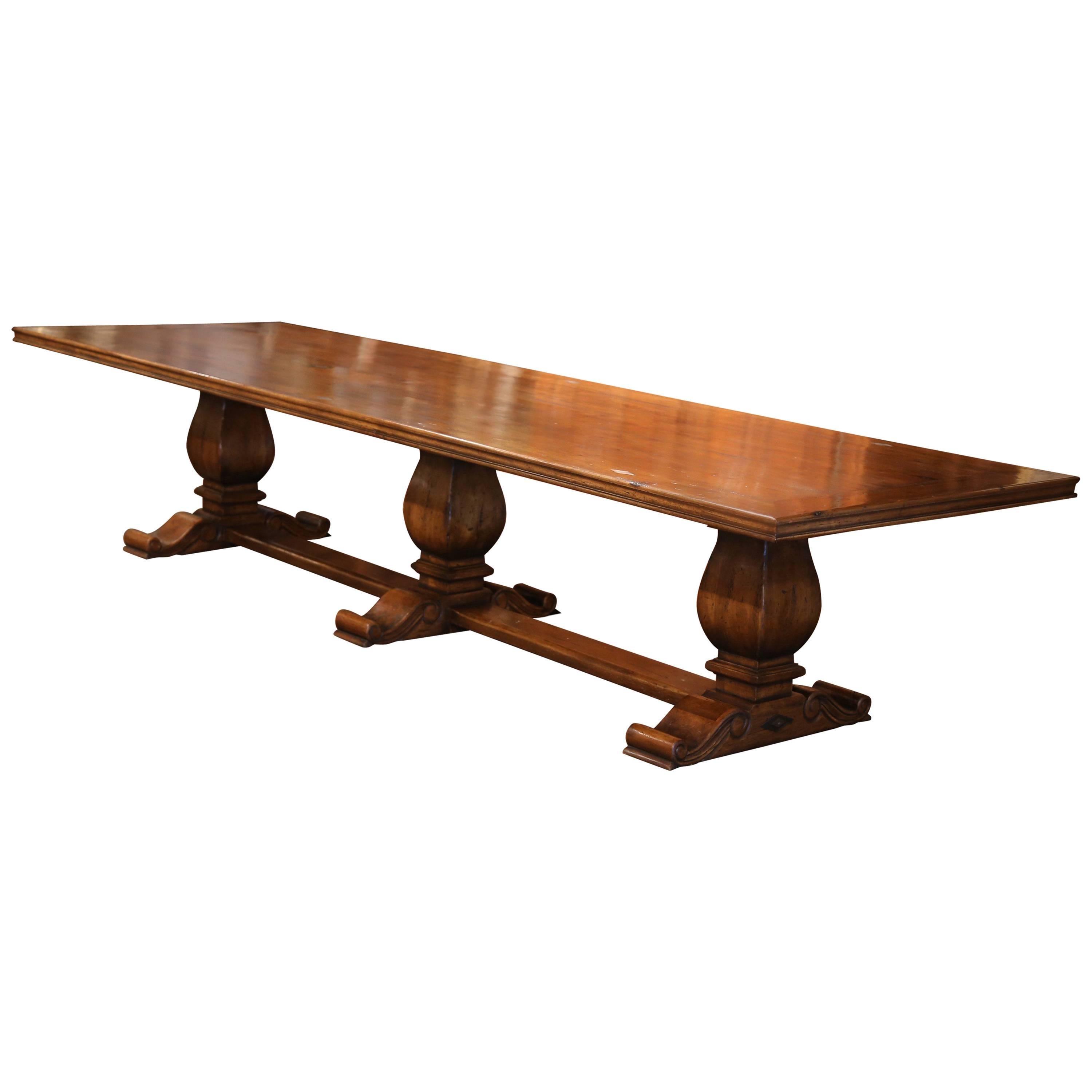 Large French Louis XIII Style Walnut Trestle Farm Table with Three Carved Legs