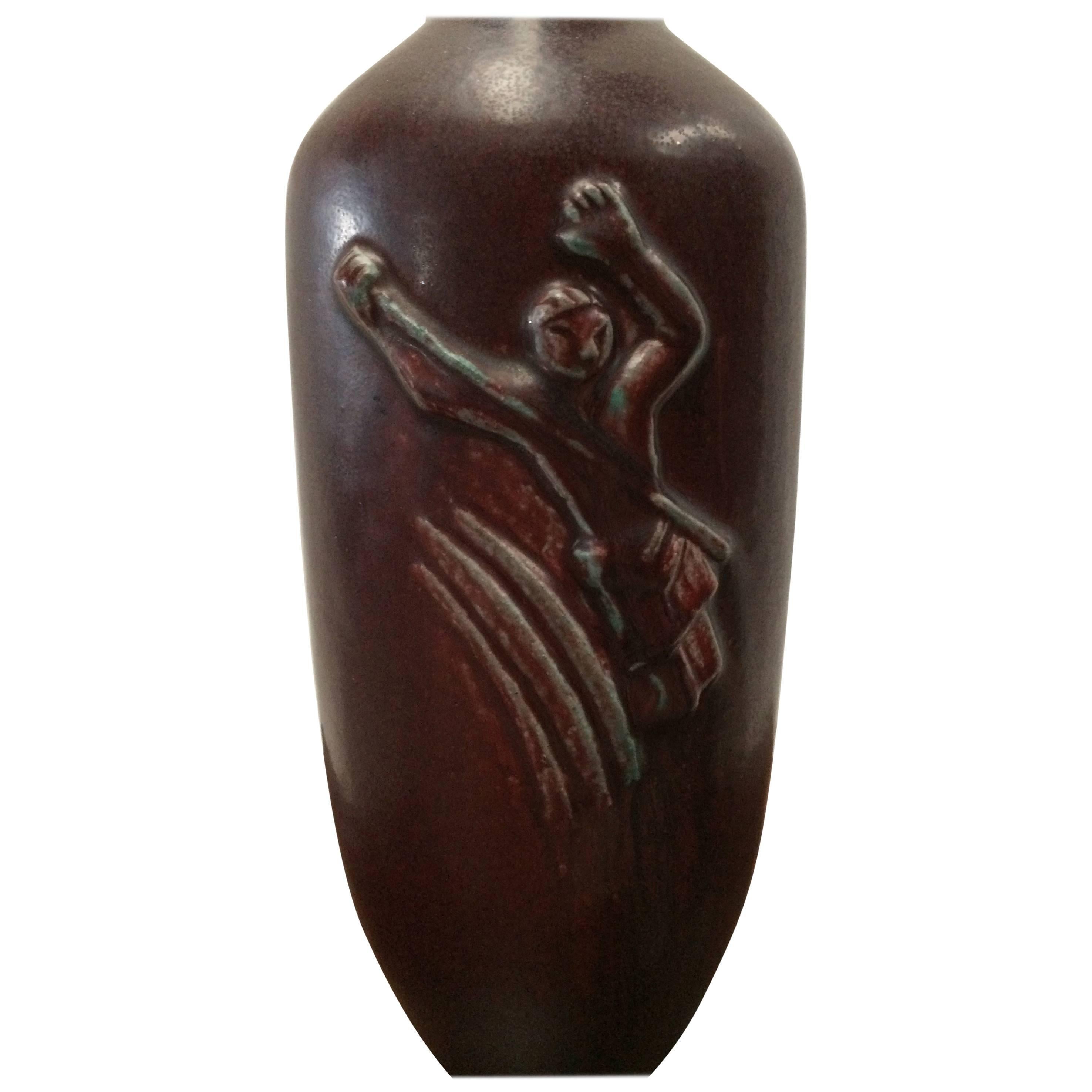 Large oxblood stoneware vase with relief decorations depicting David with lion, 

Base marked: Royal Copenhagen, Painted three wave lines, Jais and incised 21025

Period 1920-1940.

Like all of our upholstered items the chair can also be newly