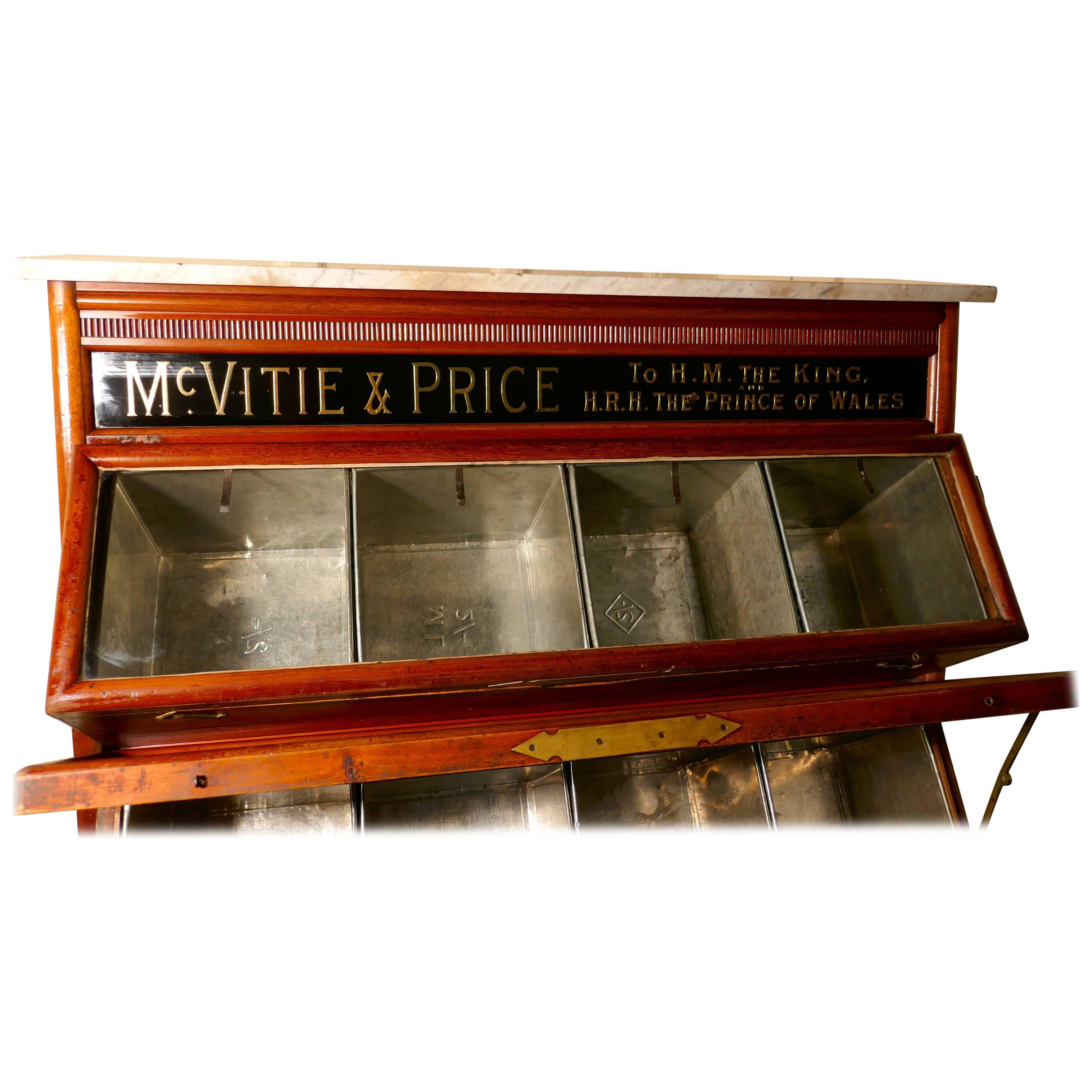 McVitie & Price Cake shop biscuit tin display cabinet

This is a large glazed biscuit tin display cabinet is made in mahogany, it holds the tins at an angle so that the contents can be easily accessed and viewed, there are four tins in each of the
