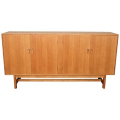 Danish Mid-Century Oak Credenza, Four-Door with Leather Pulls, by Kurt Østervig