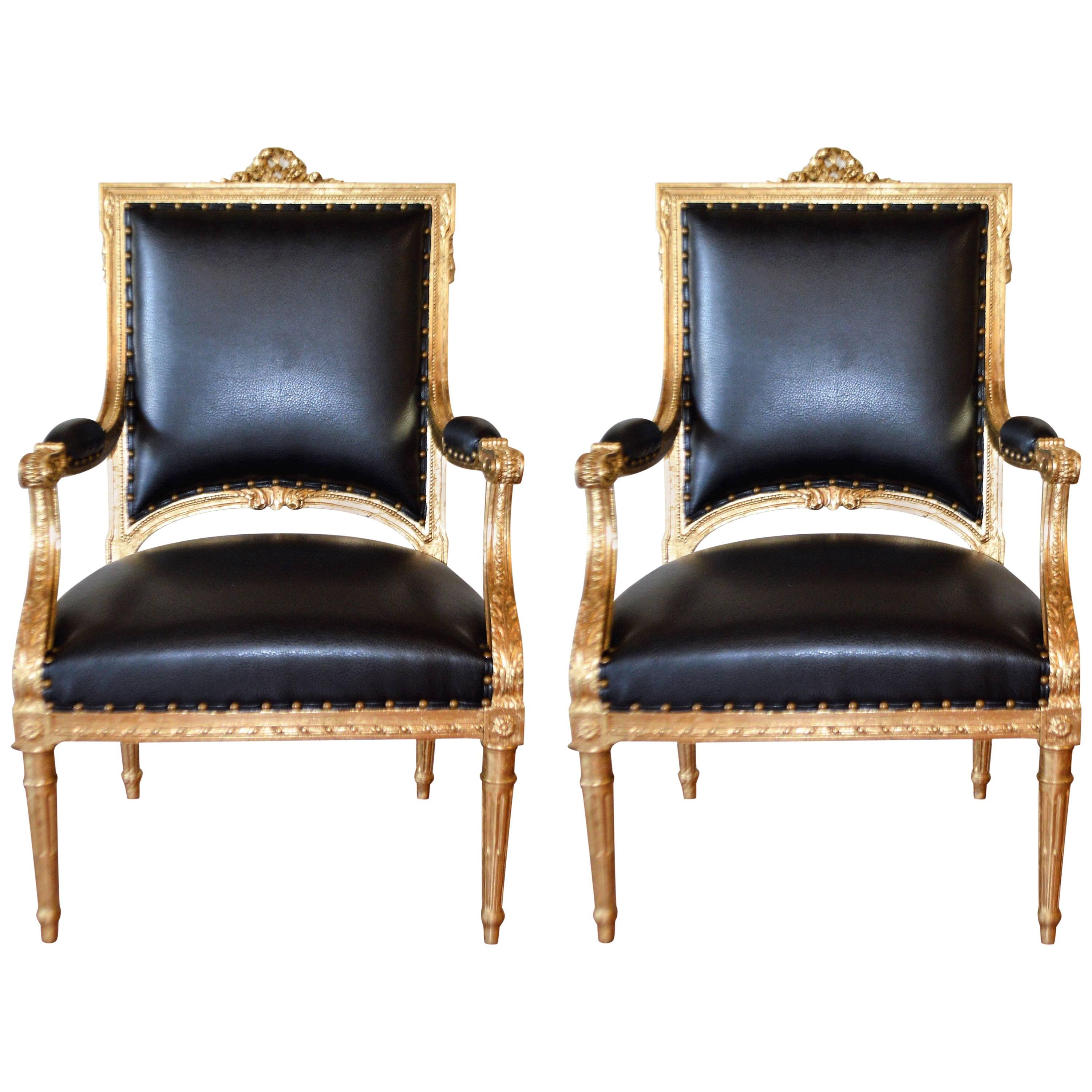 Pair of Louis XVI Style Gilded Armchairs Newly Upholstered in Black Faux Leather