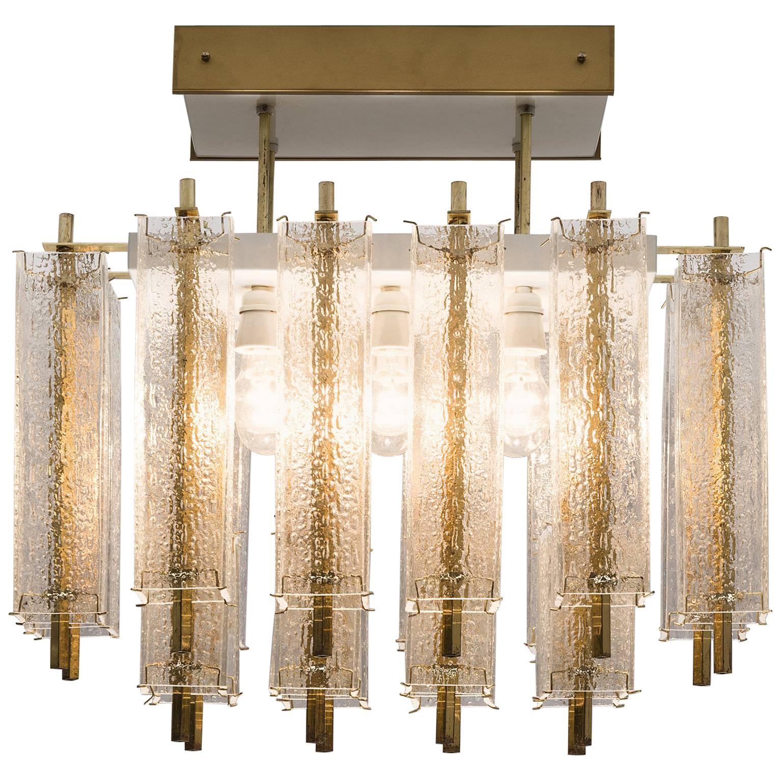 Three Chandeliers in Structured Glass and Brass, 1970s