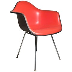 Herman Miller Charles Eames Shell Chair Is a Nice Orange on Taupe Fiberglass