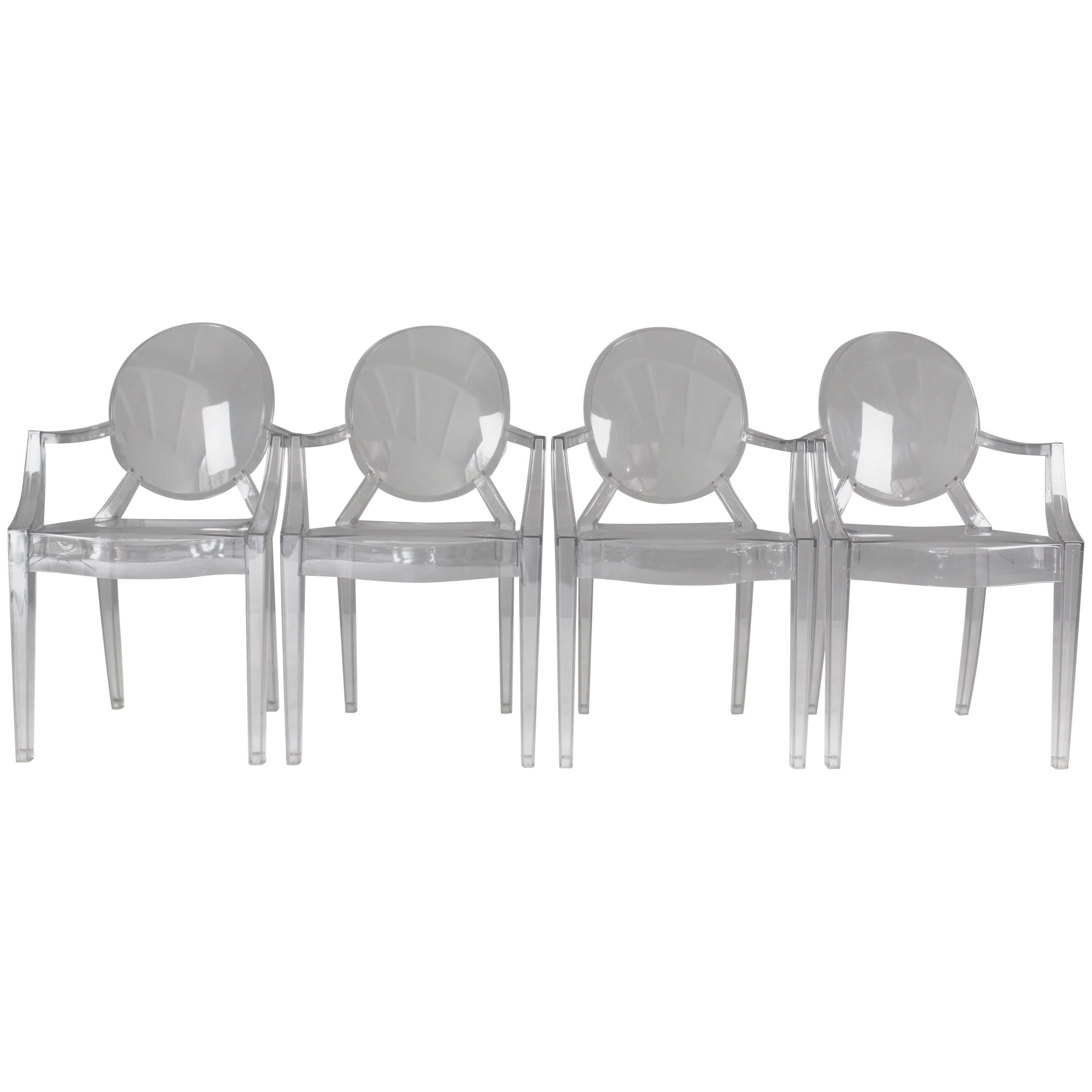 Four Kartell Ghost Chairs