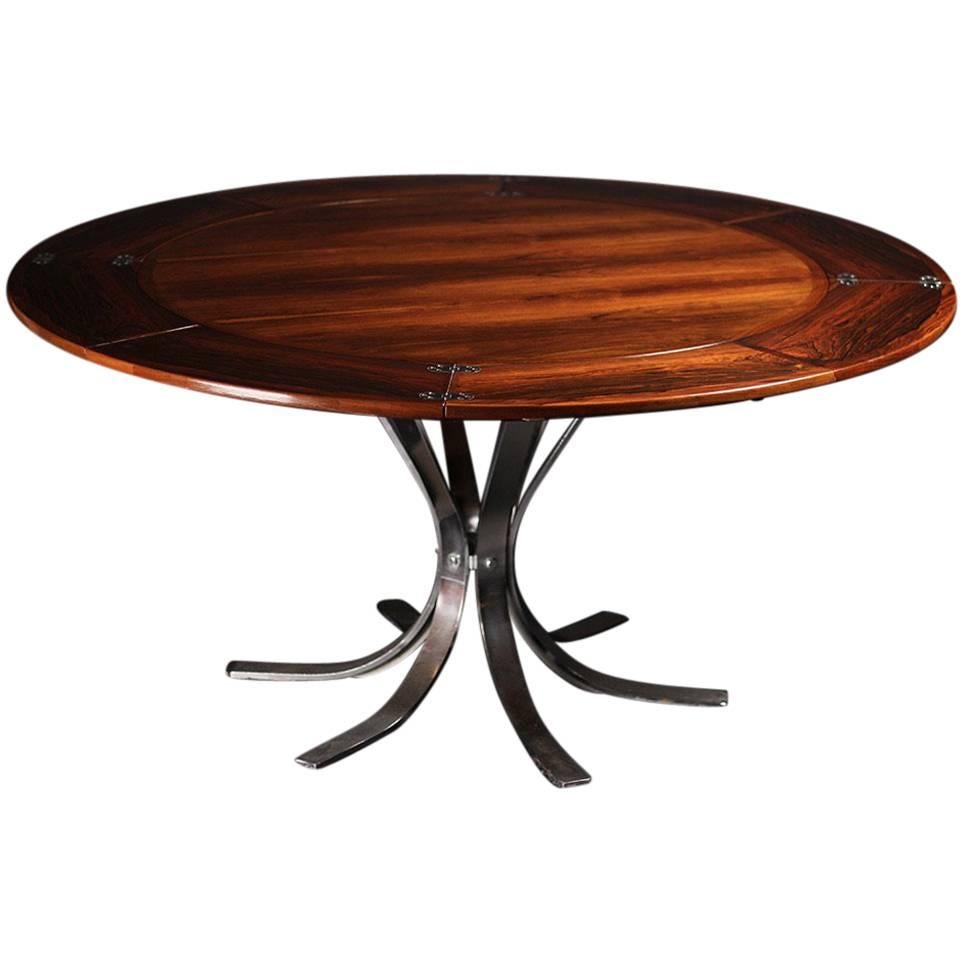 Scandinavian Modern Rosewood Dining Table by Dyrlund of Denmark.