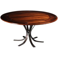 Retro Scandinavian Modern Rosewood Dining Table by Dyrlund of Denmark.