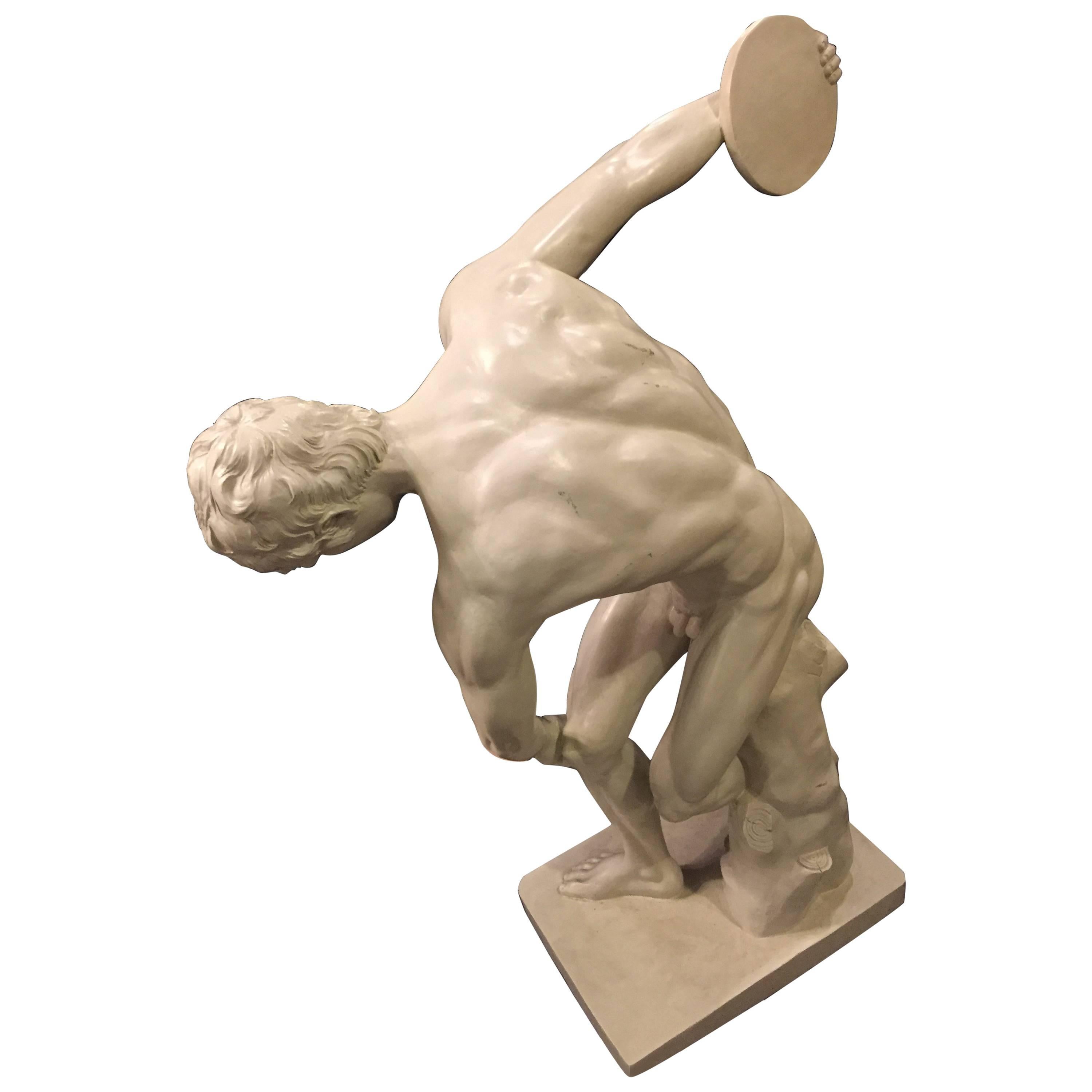 Fiberglass life-sized discus thrower sculpture. This finely detailed sculpture is of a naked discus thrower with all parts in tact. This life-sized piece is sure to add controversy to any room in the home or office.