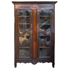 Antique French Rustic Carved Wood Armoire, circa 1850