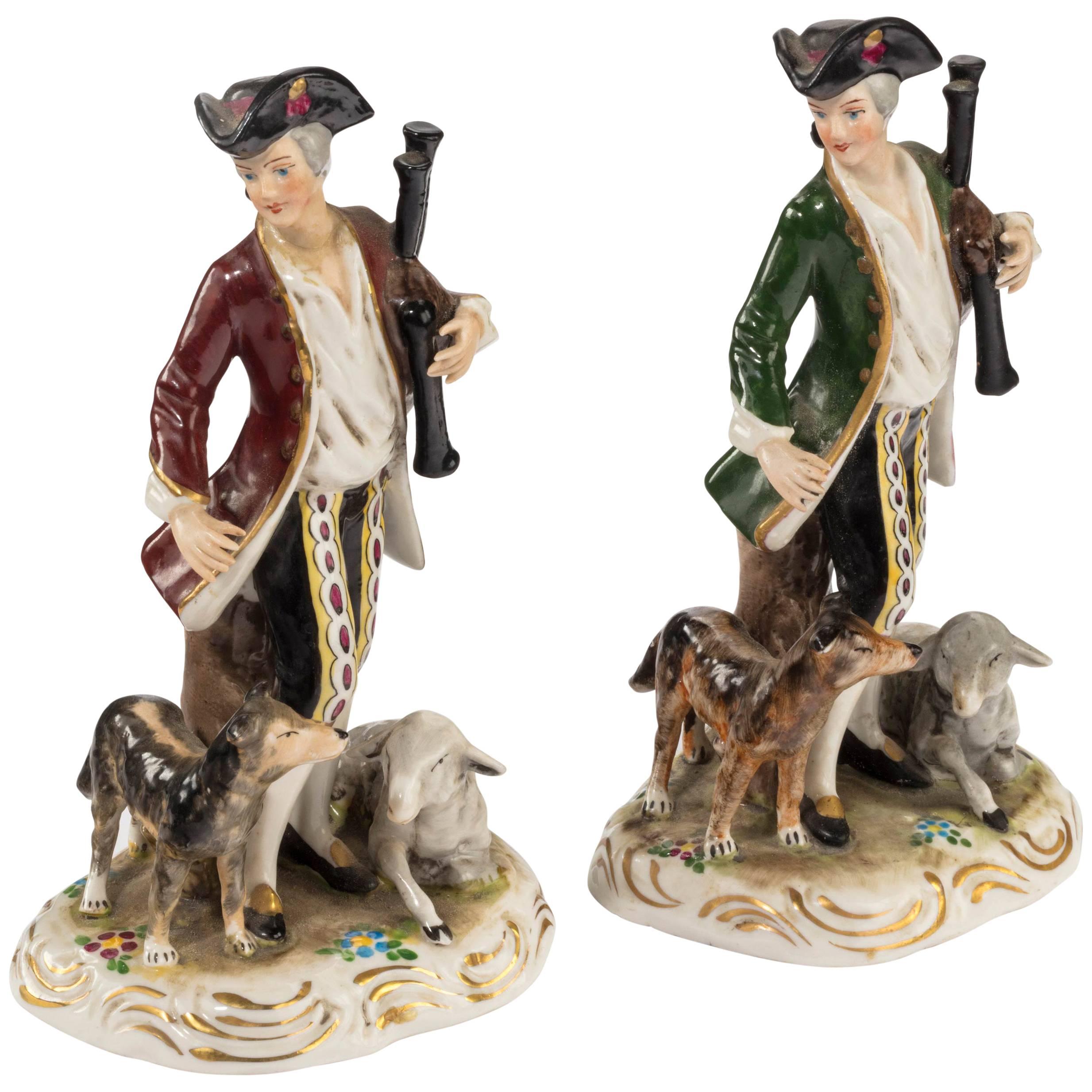 Pair of Early 20th Century Continental Porcelain Figures of Huntsman and Animals For Sale