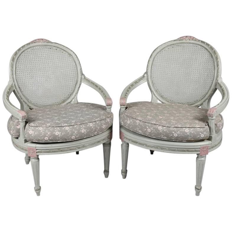 Pair of French Louis XVI Style Paint Decorated Caned & Upholstered Armchairs