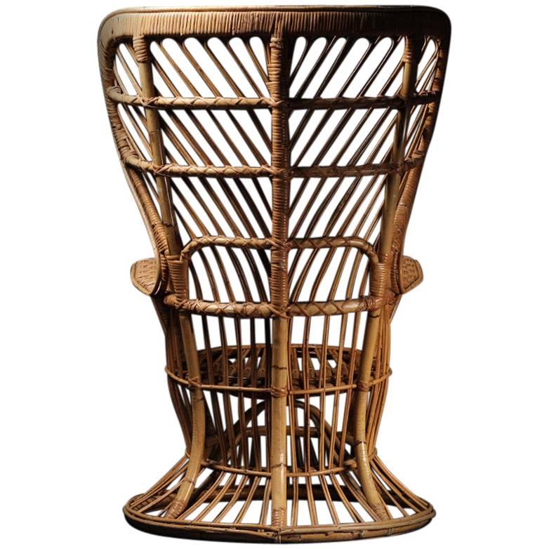 Wicker chair designed by Lio Carminati