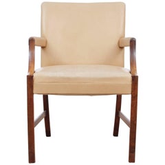 Fauteuil moderne du milieu du siècle dernier en bois de rose d'Ole Wanscher