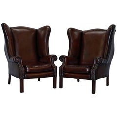 Vintage Pair of Restored Brown Leather Porters Wide Wingback Armchairs