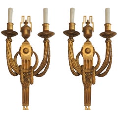 Pair of French Regency Neoclassical Wreath Draped Urn Two-Arm Bronze Sconces