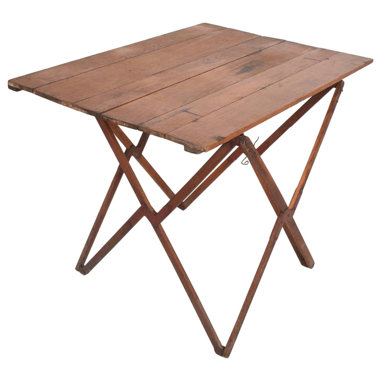 Unusual folding campaign console table. at 1stDibs