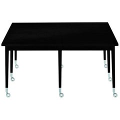 "Neoz" Castored Square Ebonized Mahogany Coffee Table by P. Starck for Driade