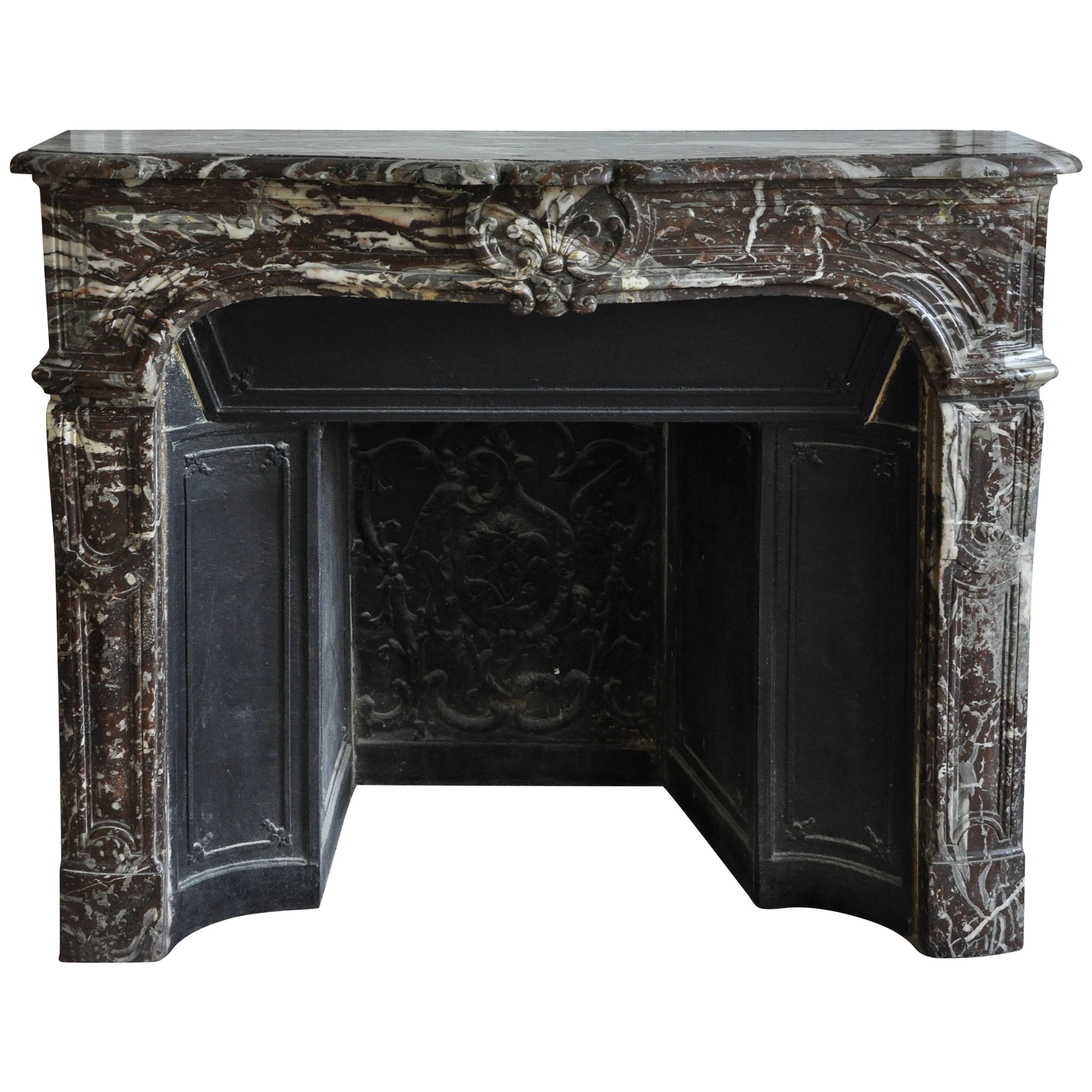 Antique Regence Period Fireplace in Royal Red Marble with its Complete Cast Iron For Sale