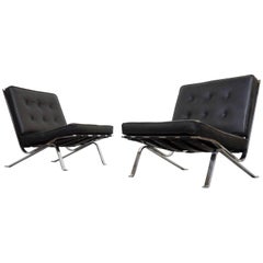 Pair of RH-301 Flat Bar Lounge Chairs in black leather Robert Haussmann. De Sede