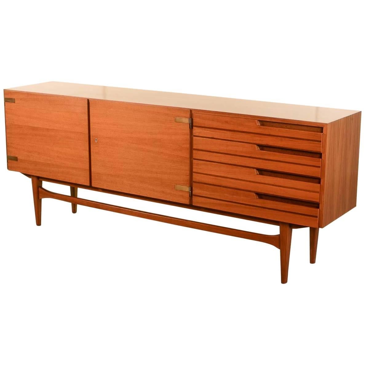 Distinguished Mid-Century Satinwood and Brass Sideboard with Duotone Drawers For Sale