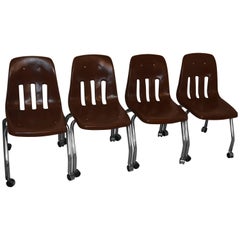 Desk Chairs Set of Four with Chrome Legs and Vinyl Shell on Wheels, circa 1970