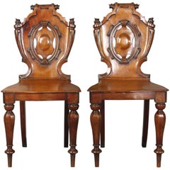 Pair of English William IV Carved Mahogany Hall Chairs
