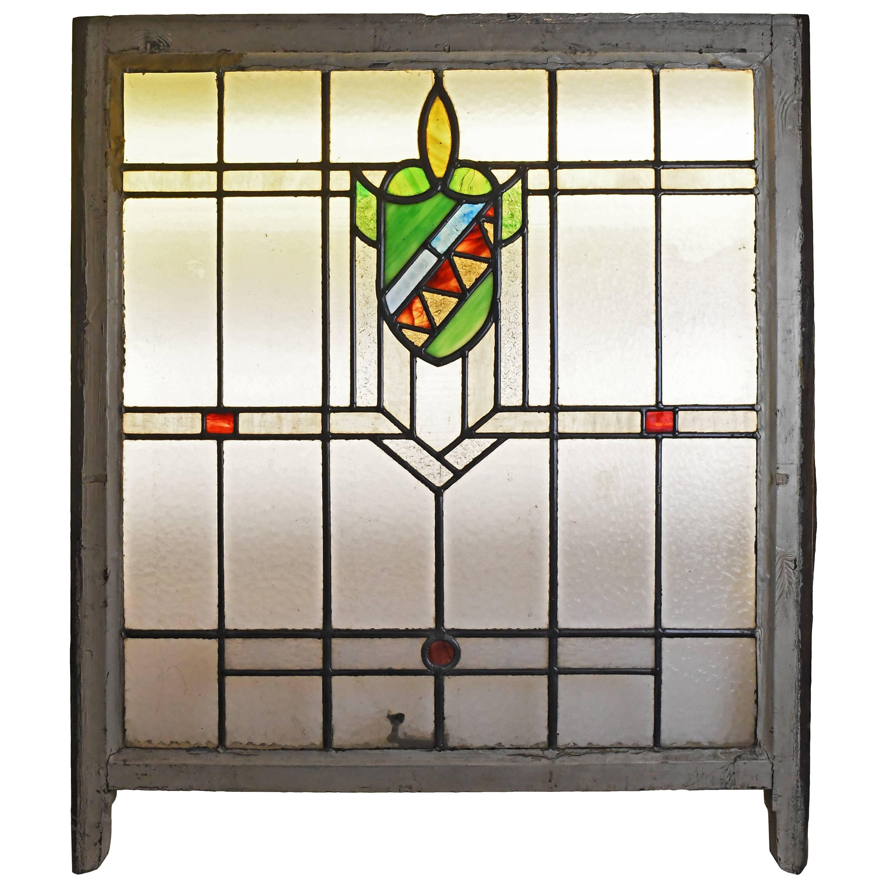 Stained Glass Window with Red and Green Shield