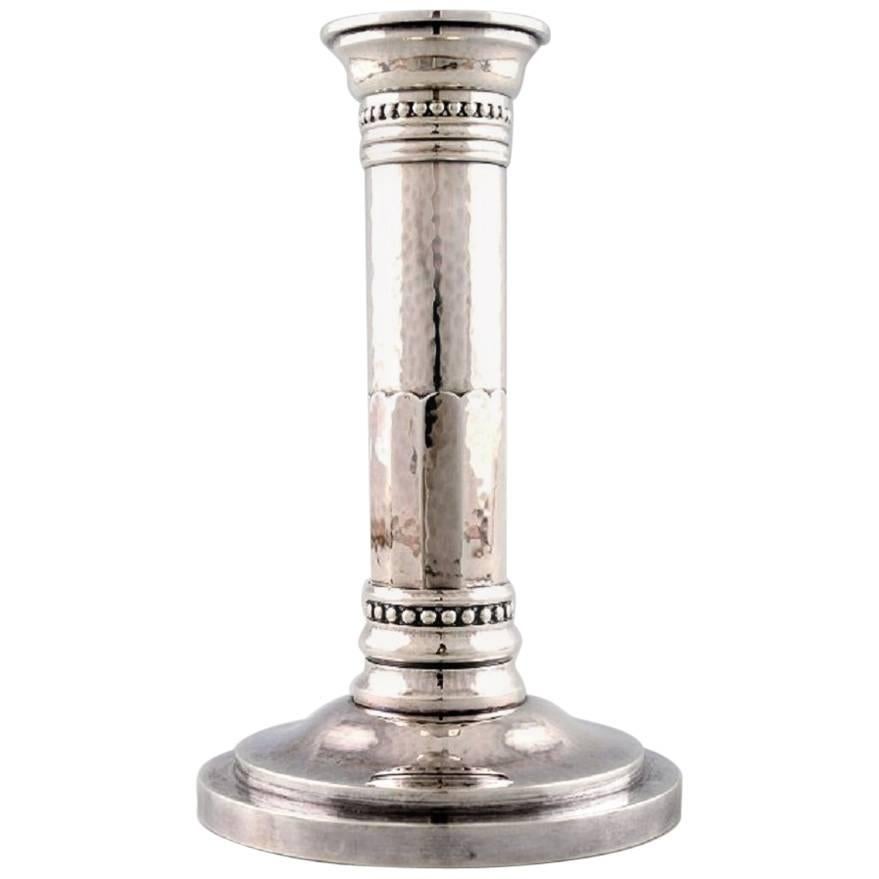Johan Rohde Candlestick of Hammered Sterling Silver on Round Foot, Georg Jensen