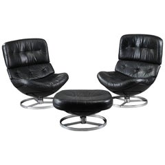 Pair of Swivel Armchairs and Ottoman in Fiberglass and Leather