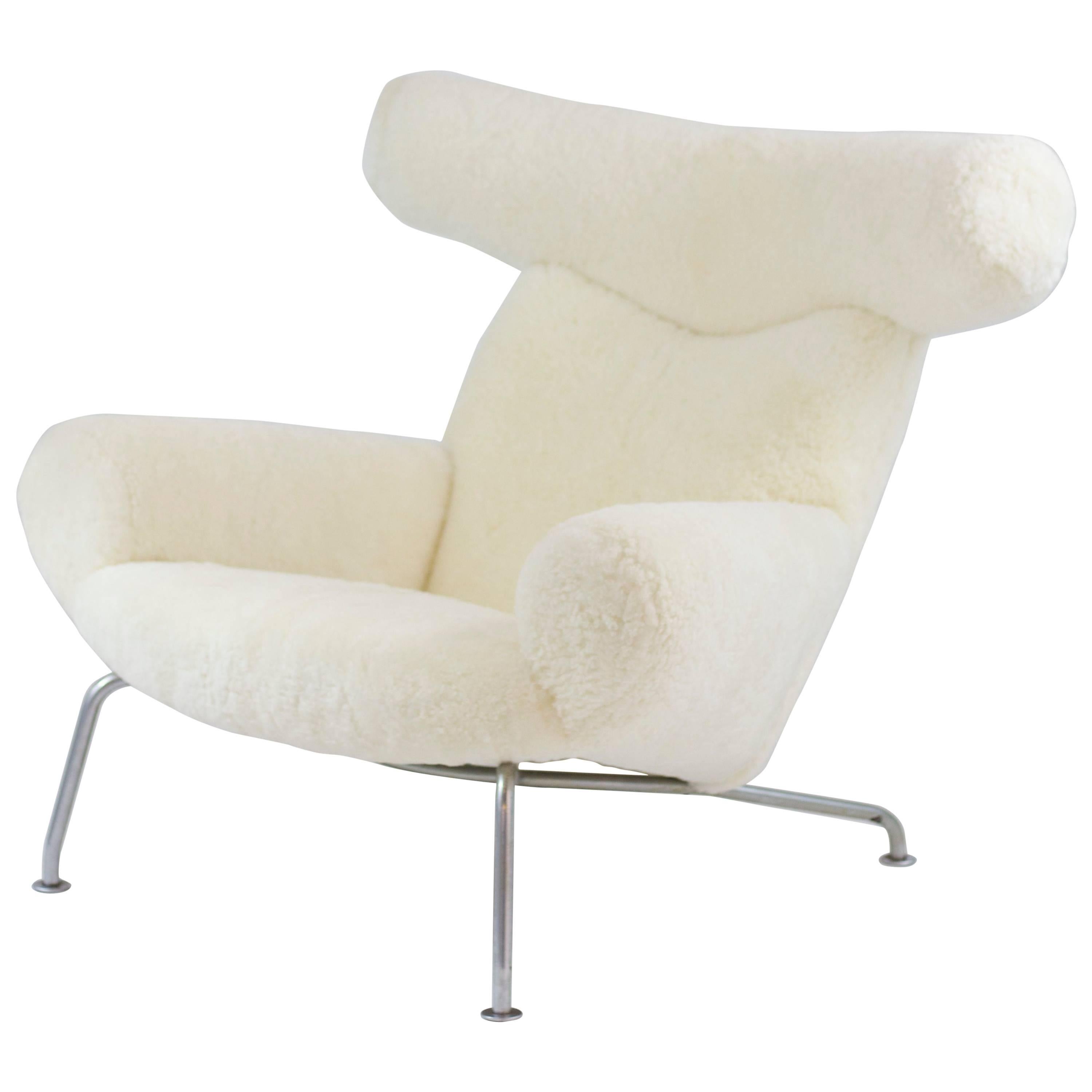 Iconic Hans Wegner Ox Chair in Sheepskin For Sale