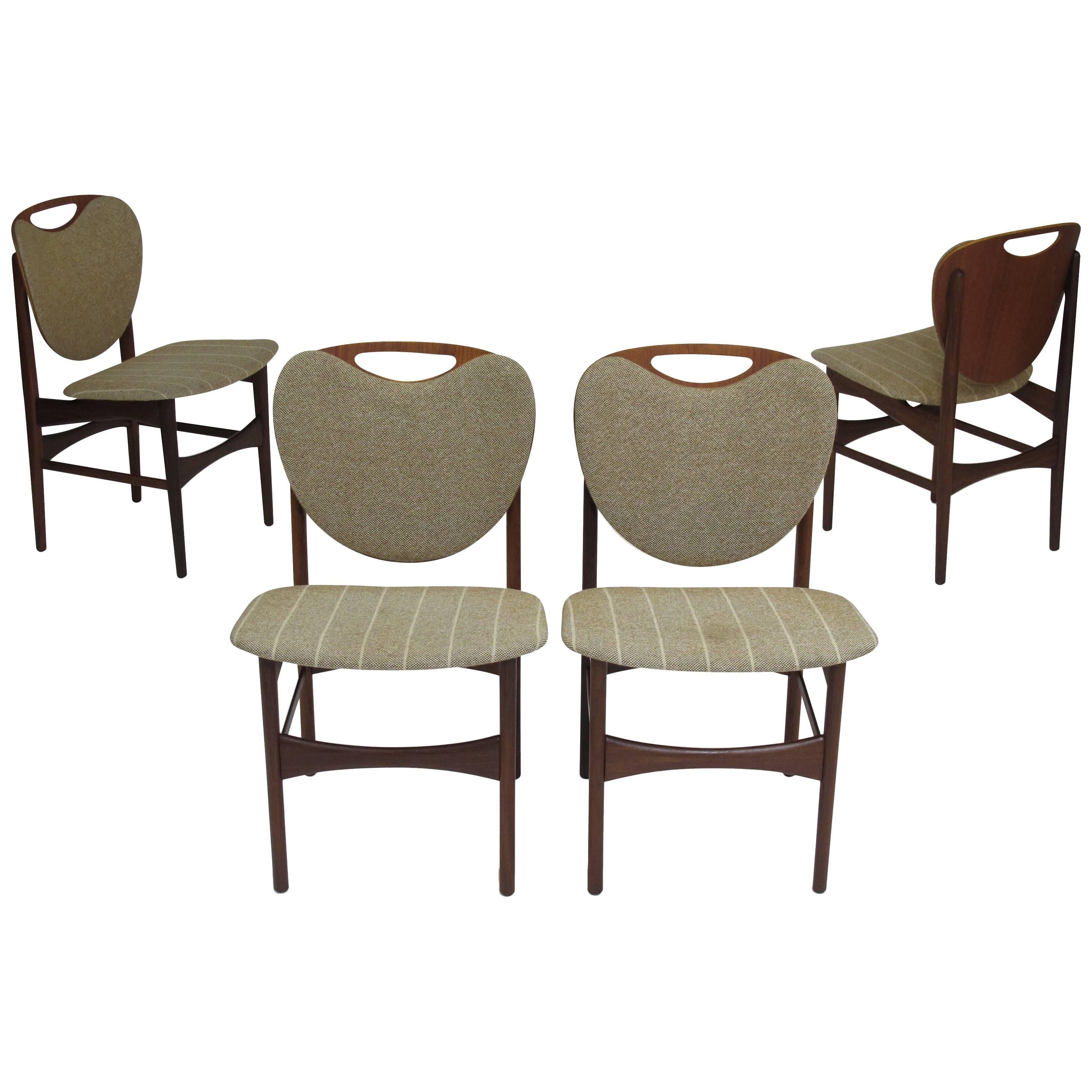 Four Shield Back Teak Dining Chairs