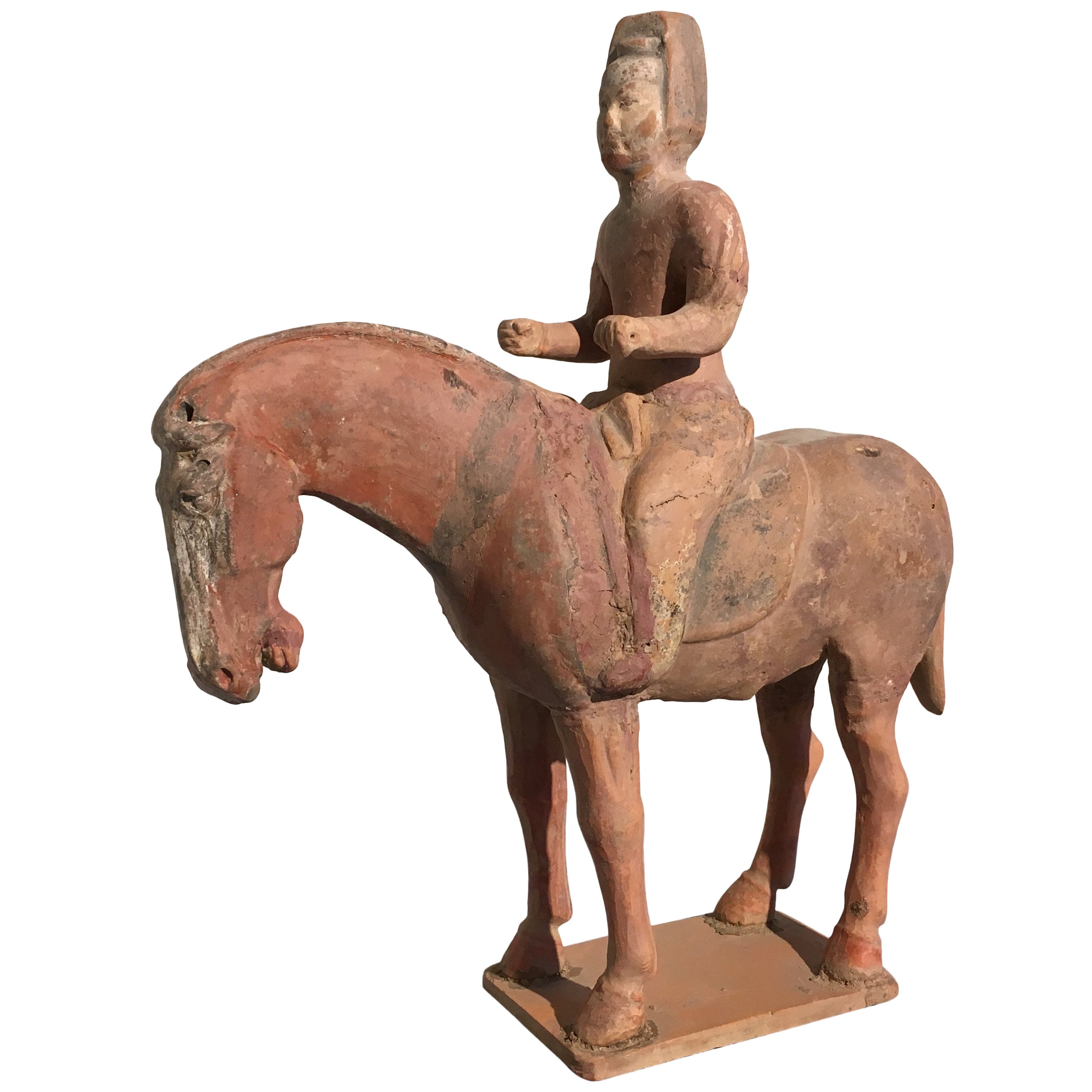 7th10th Century Tang Dynasty Terracotta Statuette of a Horse with Rider at 1stDibs