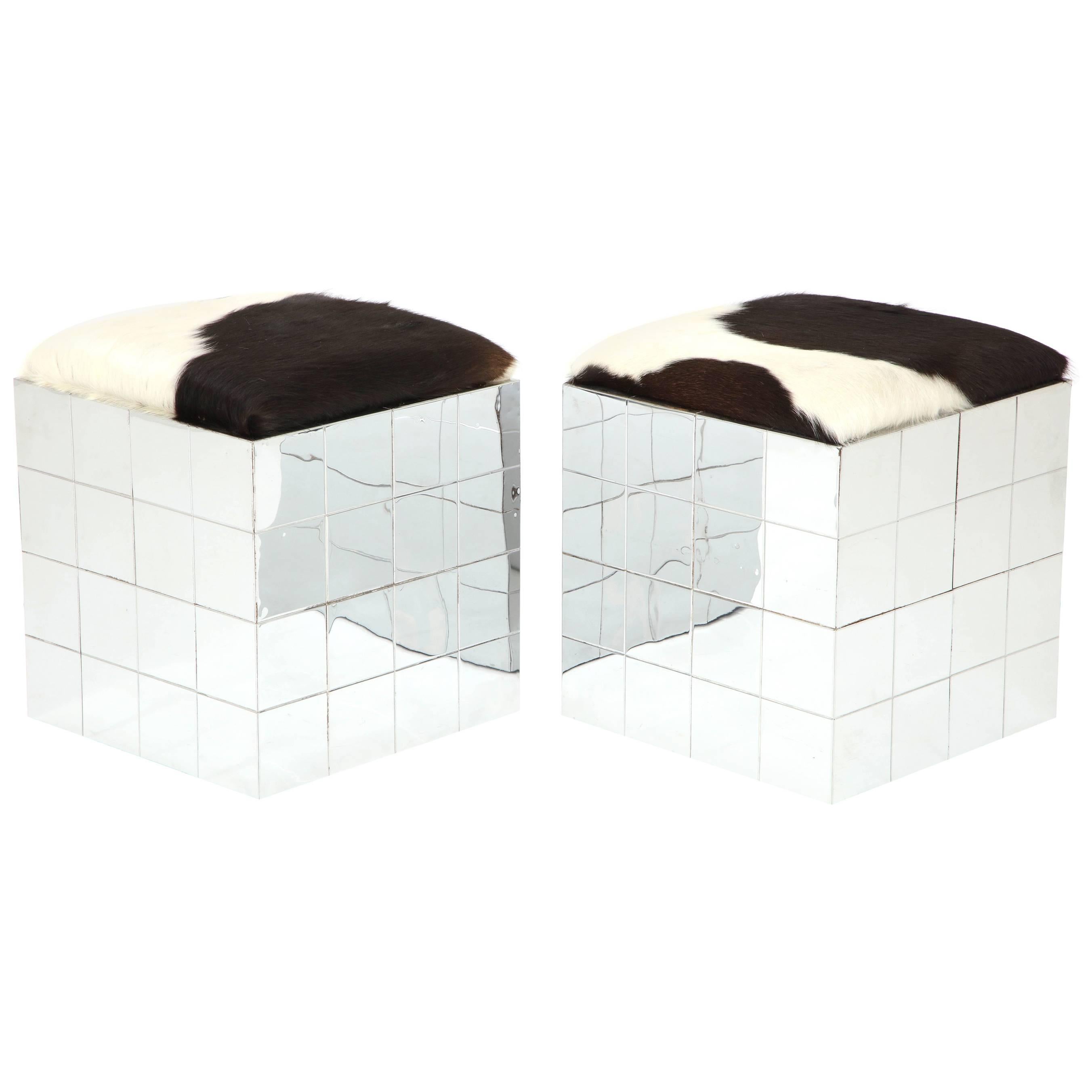 Pair of Cowhide Ottomans in the Style of Paul Evans