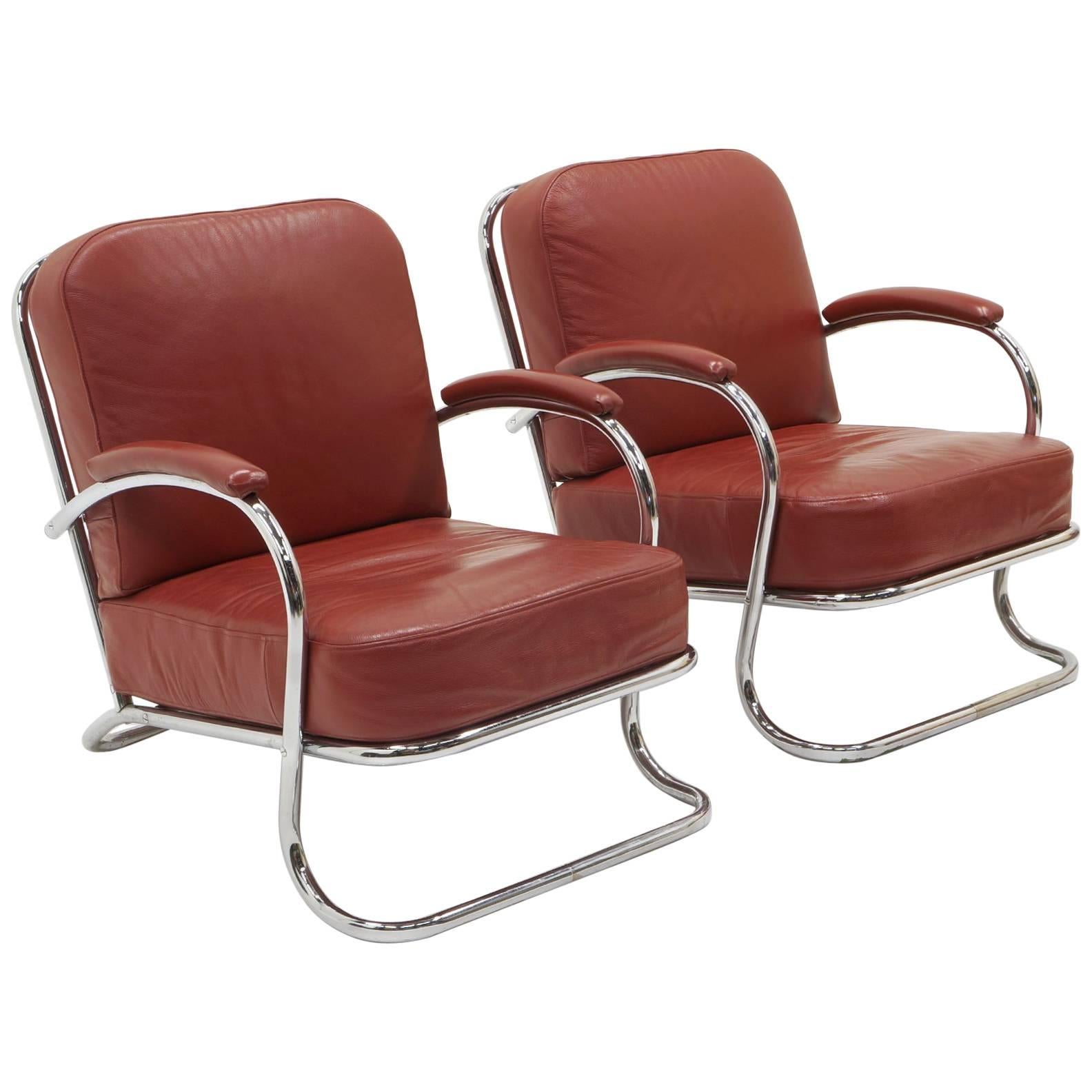 Pair of Tubular Chrome and Red Leather Lounge Chairs by KEM Weber for Lloyd