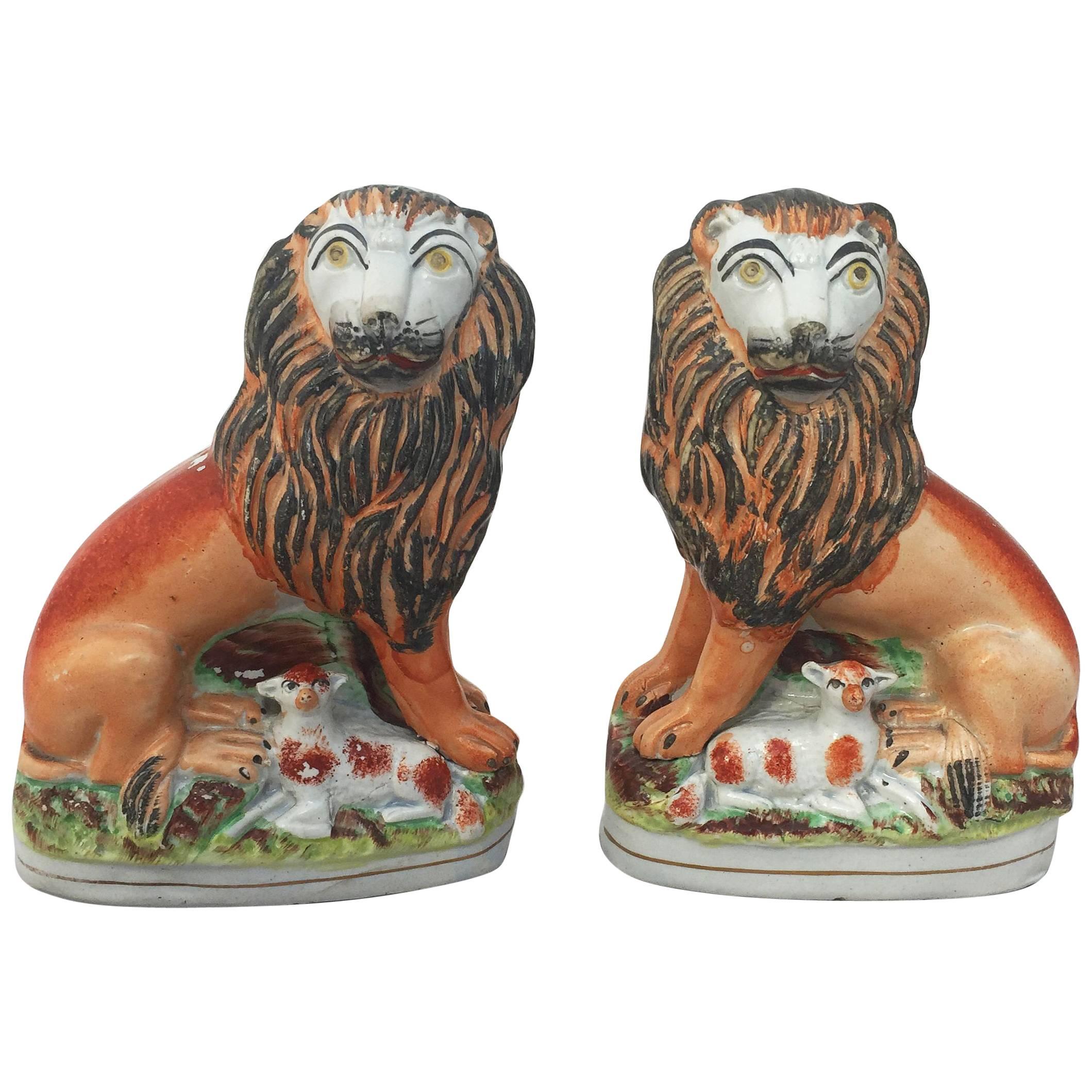 Pair of 19th Century English Staffordshire Lions with Lambs