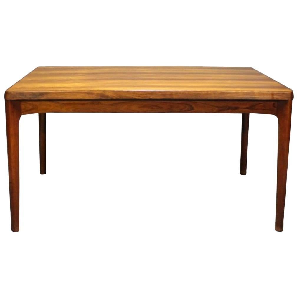 Dining Table in Sunfaded Rosewood with Extensions by Henning Kjærnulf, 1960s