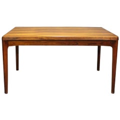 Dining Table in Sunfaded Rosewood with Extensions by Henning Kjærnulf, 1960s