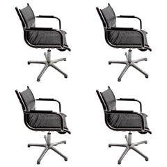 Four Chrome and Black Swivel Chairs by Olymp