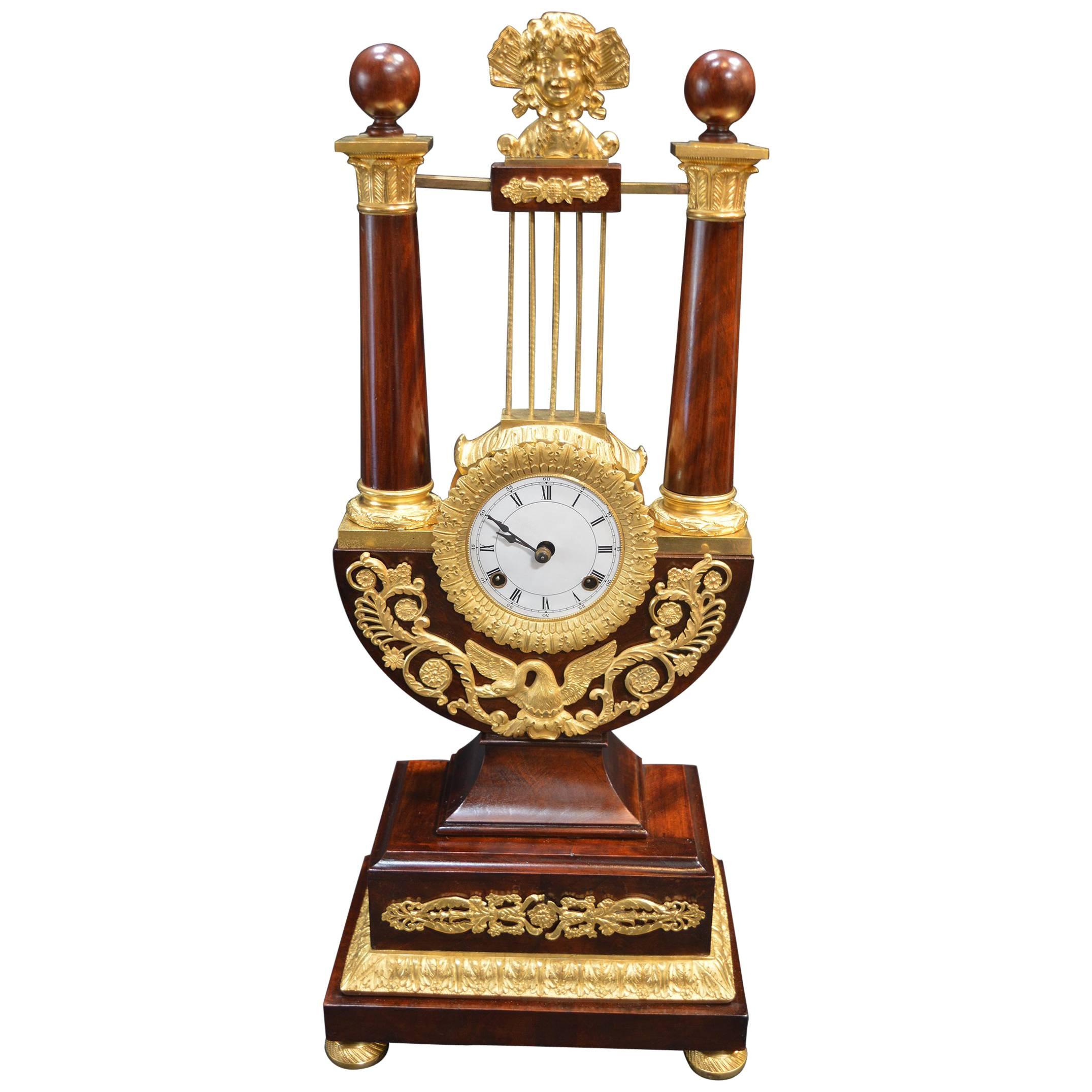 Empire Mahogany Clock with Gilded Ormolu