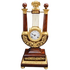 Empire Mahogany Clock with Gilded Ormolu