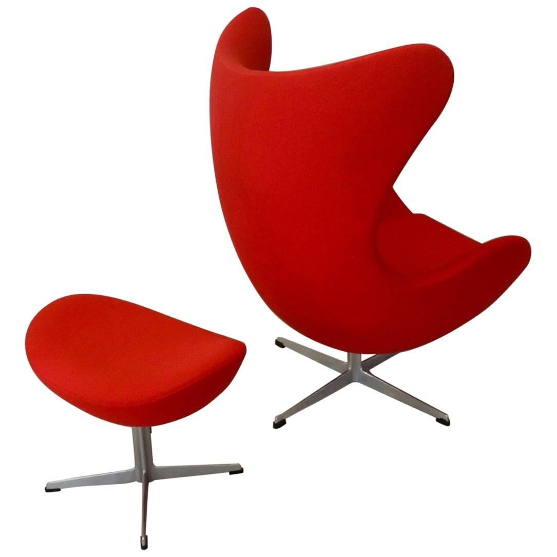 Beautifully restored red Arne Jacobsen Fritz Hansen Egg Chair with Ottoman
