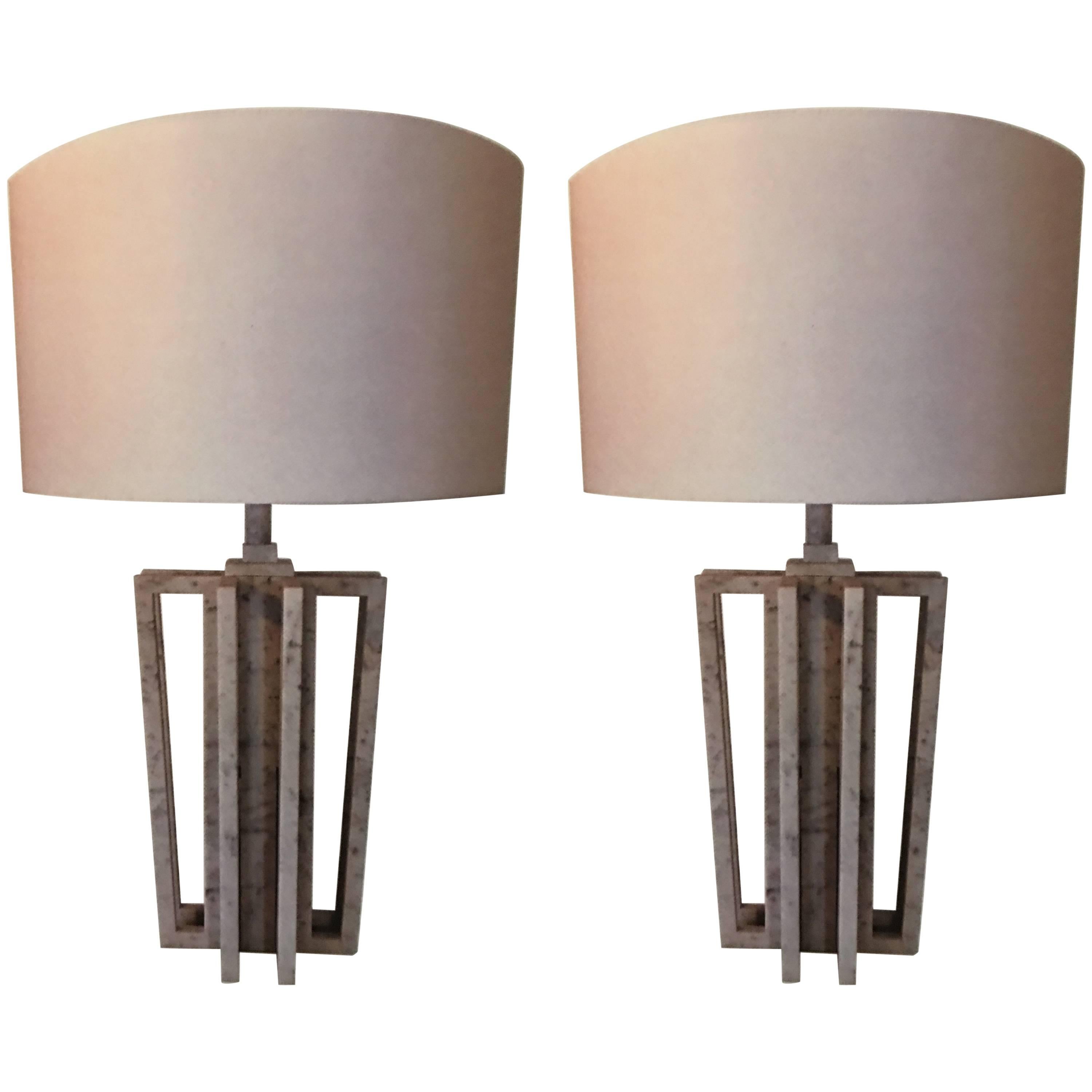 Pair of VARA Italian white Carrara marble table lamps by Massimo Mangiardi. 

Sleek modern pieces with unique construction with inter-stacked open framed parts totally in white Carrara marble forming the base. 

            